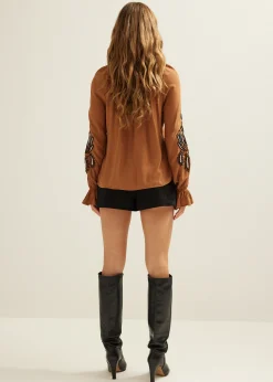 Blouse met borduurwerk