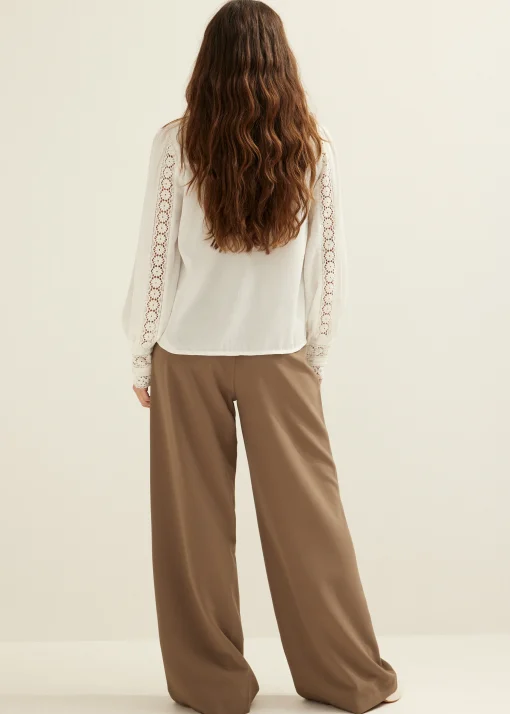 blouse met tape details