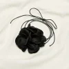 Corsage met bloem