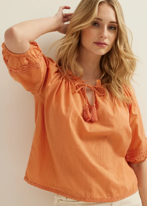 Oranje top met tape details