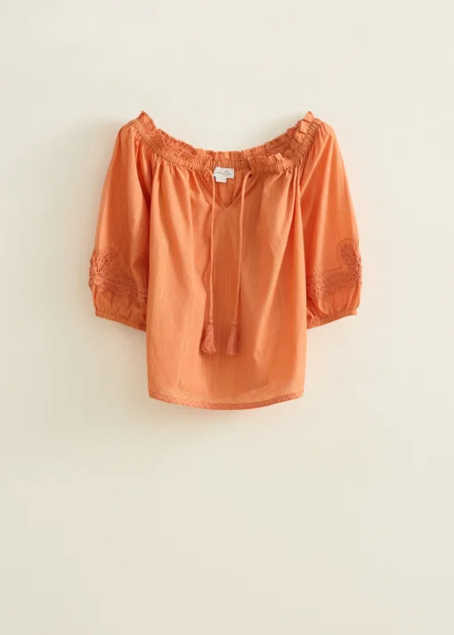 Oranje top met tape details