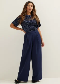 Pantalon met geplooide details