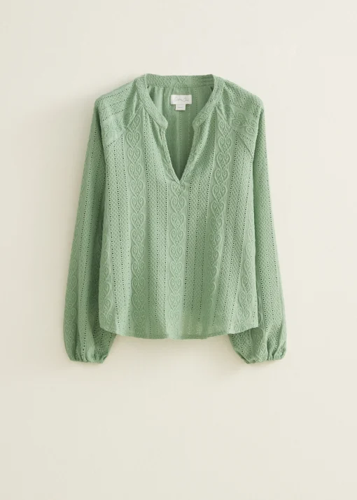 Top met broderie structuur