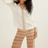 Top met gehaakte details