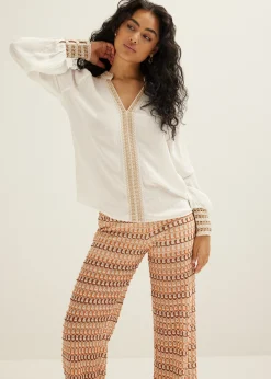 Top met gehaakte details