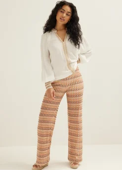 Top met gehaakte details